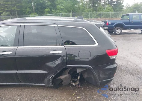 2014 Jeep Grand Cherokee Overland z USA, uszkodzony, nr VIN 1C4RJFCTXEC182339